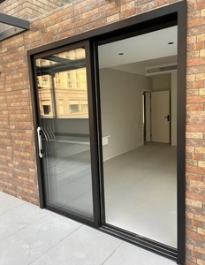 Modern Minimalist Residential Exterior Black Slim Frame Windproof &amp; Waterproof Aluminum Sliding Door