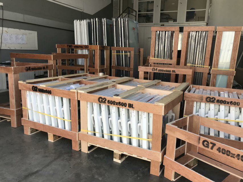 Windows packed by plastic film and wooden box